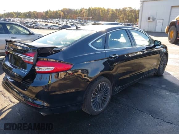✅ 2017 Ford Fusion Hybrid Titanium • VIN: 3FA6P0RU4HR357758 • Лот: 43474937. Опубликован ранее на IAAI с пробегом 190 369 миль. Бесплатный доступ к архиву аукционных продаж из США и подробный отчёт об истории автомобиля на DreamBid. Изображение 4.