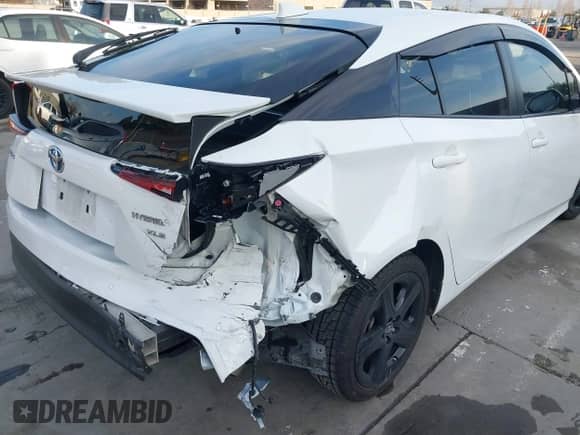 2021 Toyota Prius L Eco with VIN JTDKAMFU9M3131228, listed as a IAAI auction lot 41257117 with 72,840 mi miles and . Bid and sale history available at DreamBid. Image 6.
