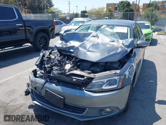 ✅ 2013 Volkswagen Jetta Hybrid SE • VIN: 3VW637AJ1DM232687 • Лот: 41973407. Опубликован ранее на IAAI с пробегом 70 428 миль. Бесплатный доступ к архиву аукционных продаж из США и подробный отчёт об истории автомобиля на DreamBid. Изображение 2.