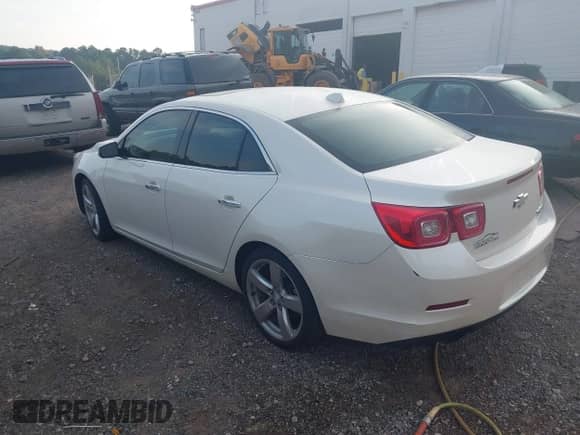 2013 Chevrolet Malibu LTZ with VIN 1G11J5SX5DF223834, listed as a IAAI auction lot 42792315 with 208,506 mi miles and . Bid and sale history available at DreamBid. Image 3.