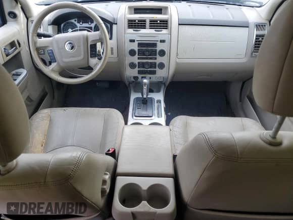 2009 Mercury Mariner with VIN 4M2CU81759KJ04555, listed as a Copart auction lot 85778504 with 130,514 mi miles and Salvage title. Bid and sale history available at DreamBid. Image 8.