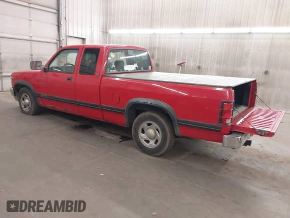 1996 Dodge Dakota with VIN 1B7GL23X5TS515398, listed as a IAAI auction lot 41837429 with 118,838 mi miles and . Bid and sale history available at DreamBid. Image 3.