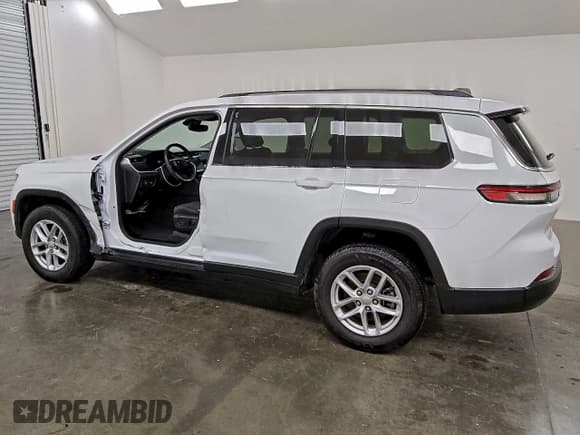 ✅ 2023 Jeep Grand Cherokee Laredo • VIN: 1C4RJJAG0P8883339 • Lot: 94810625. Listed on Copart with 84,325 mi. Free auction sales archive from the USA and detailed vehicle history report at DreamBid. Image 2.