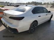 ✅ 2023 BMW 7 Series 760i xDrive • VIN: WBA33EJ06PCL49704 • Лот: 76090314. Опубликован ранее на Copart с пробегом 27 123 миль. Бесплатный доступ к архиву аукционных продаж из США и подробный отчёт об истории автомобиля на DreamBid. Изображение 3.