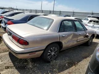 ✅ 1999 Buick LeSabre Custom • VIN: 1G4HP52K4XH472879 • Лот: 58157014. Опубликован ранее на Copart с пробегом 64 759 миль. Бесплатный доступ к архиву аукционных продаж из США и подробный отчёт об истории автомобиля на DreamBid. Изображение 3.