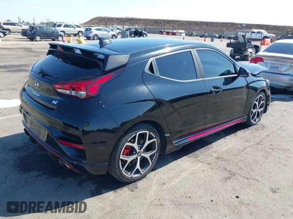 2019 Hyundai Veloster N z VIN KMHT36AH6KU002659, wystawiony jako IAAI lot #42653466 z przebiegiem 67 977 mil mil oraz . Historia ofert i sprzedaży dostępna na DreamBid. Obrazek 4.