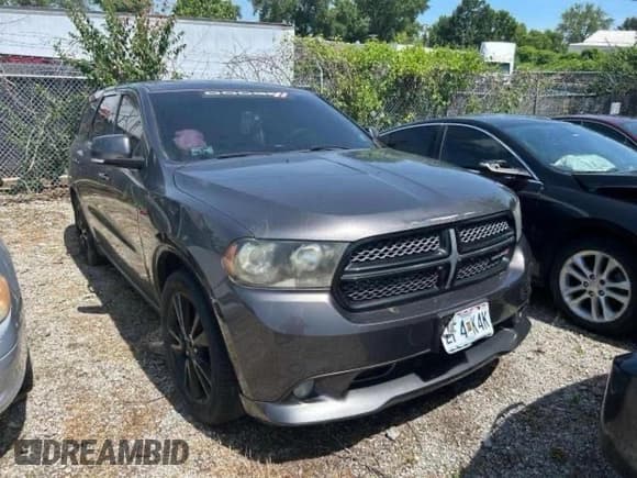✅ 2013 Dodge Durango R/T • VIN: 1C4SDHCT0DC689270 • Lot: 70104715. Wystawiony na Copart z przebiegiem 169 510 mil. Bezpłatny archiwum sprzedaży aukcyjnych z USA i szczegółowy raport historii pojazdu na DreamBid. Zdjęcie 1.