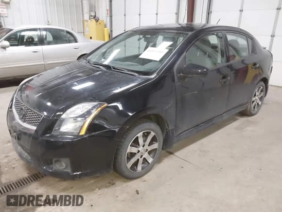✅ 2012 Nissan Sentra S • VIN: 3N1AB6AP5CL770010 • Lot: 41853597. Wystawiony na IAAI z przebiegiem 143 544 mil. Bezpłatny archiwum sprzedaży aukcyjnych z USA i szczegółowy raport historii pojazdu na DreamBid. Zdjęcie 2.