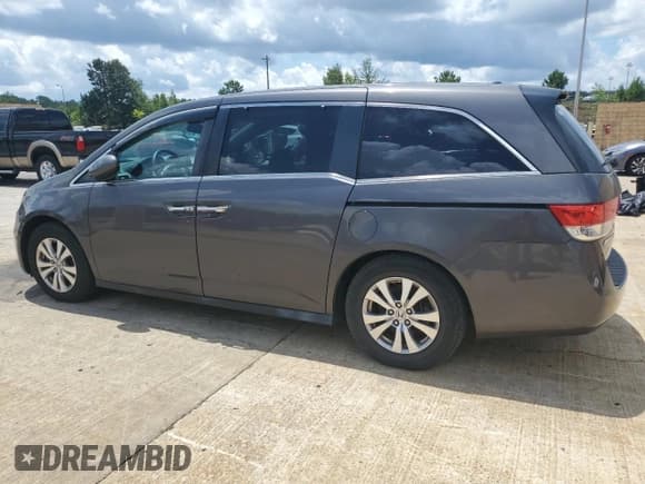 ✅ 2014 Honda Odyssey EX-L • VIN: 5FNRL5H65EB040989 • Lot: 60655755. Listed on Copart with 224,963 mi. Free auction sales archive from the USA and detailed vehicle history report at DreamBid. Image 2.