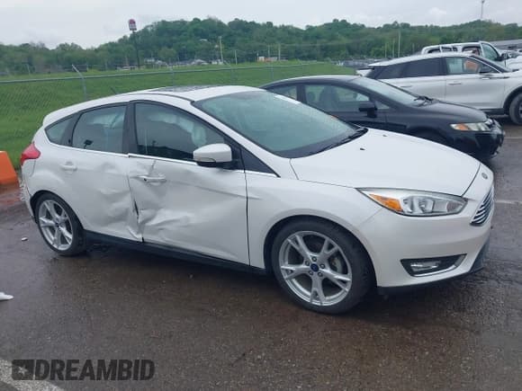 ✅ 2016 Ford Focus Titanium • VIN: 1FADP3N26GL387872 • Lot: 42183397. Listed on IAAI with 30,557 mi. Free auction sales archive from the USA and detailed vehicle history report at DreamBid. Image 13.