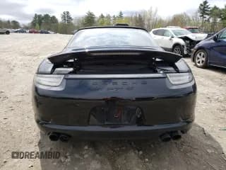 ✅ 2016 Porsche 911 4S • VIN: WP0BB2A94GS136383 • Лот: 52737084. Опубликован ранее на Copart с пробегом 54 027 миль. Бесплатный доступ к архиву аукционных продаж из США и подробный отчёт об истории автомобиля на DreamBid. Изображение 6.