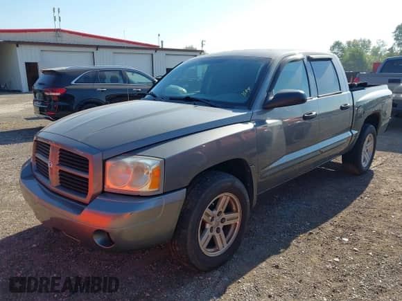 2007 Dodge Dakota SLT with VIN 1D7HW48K17S141534, listed as a IAAI auction lot 43202323 with 187,741 mi miles and . Bid and sale history available at DreamBid. Image 2.