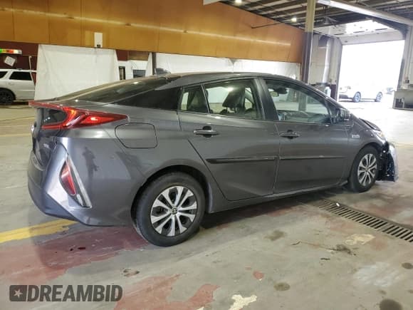 ✅ 2021 Toyota Prius LE • VIN: JTDKAMFP1M3168168 • Lot: 94025385. Listed on Copart with 75,308 mi. Free auction sales archive from the USA and detailed vehicle history report at DreamBid. Image 3.