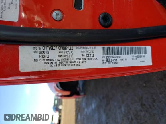 2014 Dodge Challenger SXT 100th Anniversary z VIN 2C3CDYAG0EH107469, wystawiony jako Copart lot #56201824 z przebiegiem 83 338 mil mil oraz Nie do naprawy • Non repairable. Historia ofert i sprzedaży dostępna na DreamBid. Obrazek 12.