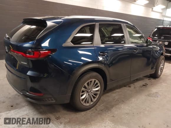 ✅ 2024 Mazda CX-90 Select • VIN: JM3KKAHD4R1182557 • Лот: 40770956. Опубликован ранее на IAAI с пробегом 4 111 миль. Бесплатный доступ к архиву аукционных продаж из США и подробный отчёт об истории автомобиля на DreamBid. Изображение 4.