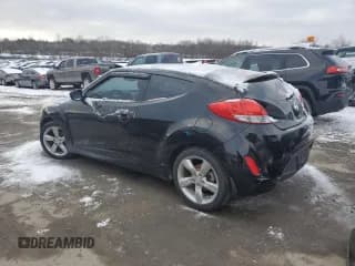 ✅ 2013 Hyundai Veloster w/Black Int • VIN: KMHTC6AD6DU087342 • Lot: 87000014. Listed on Copart with 121,700 mi. Free auction sales archive from the USA and detailed vehicle history report at DreamBid. Image 2.