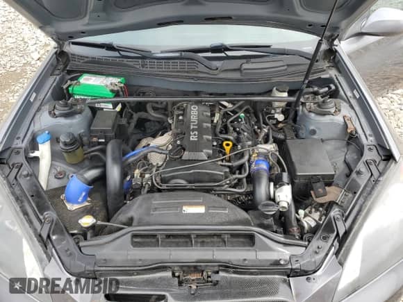 2010 Hyundai Genesis Coupe Premium z VIN KMHHT6KD7AU033984, wystawiony jako Copart lot #64473465 z przebiegiem 95 512 mil mil oraz Czysty tytuł • Clean title. Historia ofert i sprzedaży dostępna na DreamBid. Obrazek 11.