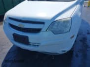 ✅ 2013 Chevrolet Captiva Sport LTZ • VIN: 3GNAL4EK5DS642748 • Lot: 41891097. Wystawiony na IAAI z przebiegiem 162 934 mil. Bezpłatny archiwum sprzedaży aukcyjnych z USA i szczegółowy raport historii pojazdu na DreamBid. Zdjęcie 6.