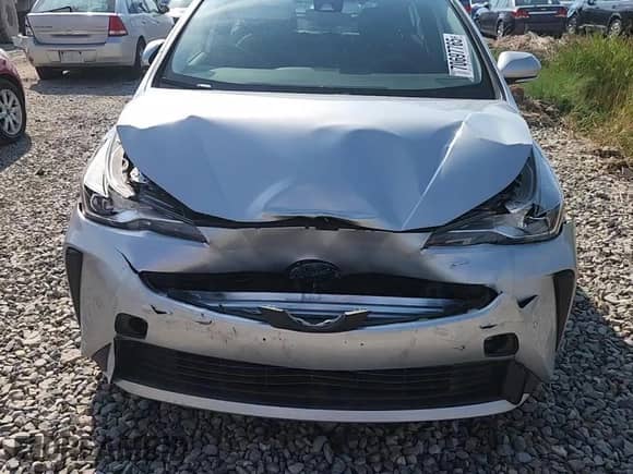 2021 Toyota Prius L Eco with VIN JTDKAMFU1M3150517, listed as a Copart auction lot 70697765 with 107,800 mi miles and Salvage title. Bid and sale history available at DreamBid. Image 13.