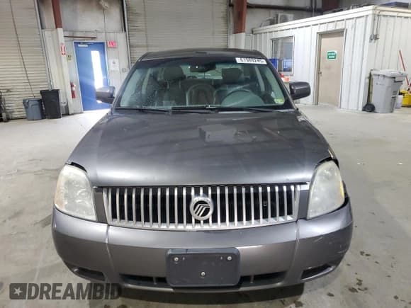 ✅ 2005 Mercury Montego Luxury • VIN: 1MEFM40115G607035 • Лот: 61989245. Опубликован ранее на Copart с пробегом 174 553 миль. Бесплатный доступ к архиву аукционных продаж из США и подробный отчёт об истории автомобиля на DreamBid. Изображение 5.