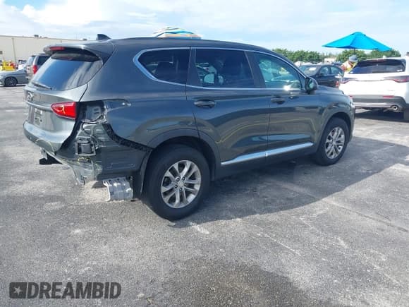 ✅ 2019 Hyundai Santa Fe SE • VIN: 5NMS23AD1KH044131 • Lot: 43237640. Wystawiony na IAAI z przebiegiem 105 619 mil. Bezpłatny archiwum sprzedaży aukcyjnych z USA i szczegółowy raport historii pojazdu na DreamBid. Zdjęcie 4.