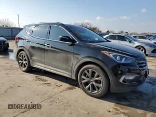 ✅ 2018 Hyundai Santa Fe Ultimate • VIN: 5XYZW4LA3JG516365 • Лот: 41126464. Опубликован ранее на Copart с пробегом Не указан. Бесплатный доступ к архиву аукционных продаж из США и подробный отчёт об истории автомобиля на DreamBid. Изображение 4.