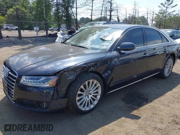 ✅ 2015 Audi A8 • VIN: WAUJGAFD3FN021160 • Lot: 42831661. Listed on IAAI with 170,130 mi. Free auction sales archive from the USA and detailed vehicle history report at DreamBid. Image 2.