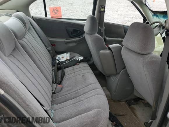 2002 Chevrolet Malibu z VIN 1G1ND52J42M683564, wystawiony jako Copart lot #85145804 z przebiegiem Nie podano mil oraz Szkoda całkowita • Salvage title. Historia ofert i sprzedaży dostępna na DreamBid. Obrazek 10.