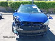 ✅ 2024 Toyota Corolla Cross XLE • VIN: 7MUDAAAG0RV100731 • Lot: 43164036. Listed on IAAI with 13,383 mi. Free auction sales archive from the USA and detailed vehicle history report at DreamBid. Image 13.