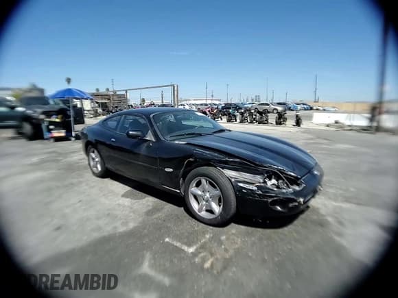 ✅ 1997 Jaguar XK • VIN: SAJGX5740VC014035 • Lot: 53066215. Wystawiony na Copart z przebiegiem 140 692 mil. Bezpłatny archiwum sprzedaży aukcyjnych z USA i szczegółowy raport historii pojazdu na DreamBid. Zdjęcie 11.
