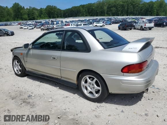 ✅ 2001 Subaru Impreza RS • VIN: JF1GM67591G402119 • Lot: 62408585. Listed on Copart with 239,694 mi. Free auction sales archive from the USA and detailed vehicle history report at DreamBid. Image 2.