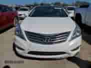 2013 Hyundai Azera z VIN KMHFH4JG3DA215115, wystawiony jako Copart lot #75914224 z przebiegiem Nie podano mil oraz Szkoda całkowita • Salvage title. Historia ofert i sprzedaży dostępna na DreamBid. Obrazek 5.