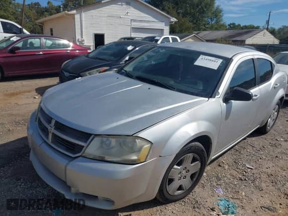 2010 Dodge Avenger SXT with VIN 1B3CC4FB2AN101552, listed as a IAAI auction lot 43498881 with 214,721 mi miles and . Bid and sale history available at DreamBid. Image 2.