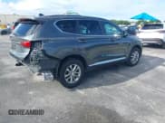 ✅ 2019 Hyundai Santa Fe SE • VIN: 5NMS23AD1KH044131 • Lot: 43237640. Wystawiony na IAAI z przebiegiem 105 619 mil. Bezpłatny archiwum sprzedaży aukcyjnych z USA i szczegółowy raport historii pojazdu na DreamBid. Zdjęcie 4.