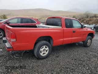 1998 Dodge Dakota SLT with VIN 1B7GG22X1WS598712, listed as a Copart auction lot 76095004 with 196,012 mi miles and Salvage title. Bid and sale history available at DreamBid. Image 3.