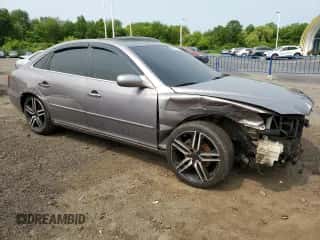 2006 Hyundai Azera SE с VIN KMHFC46F46A105028, выставлен на аукционе Copart как лот 59569815 с пробегом 219 201 миль миль и Списание • Salvage title. История ставок и продаж доступна на DreamBid. Изображение 4.