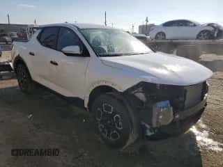 2024 Hyundai Santa Cruz SEL z VIN 5NTJBDDE5RH119014, wystawiony jako Copart lot #74174244 z przebiegiem 2 912 mil mil oraz Szkoda całkowita • Salvage title. Historia ofert i sprzedaży dostępna na DreamBid. Obrazek 4.