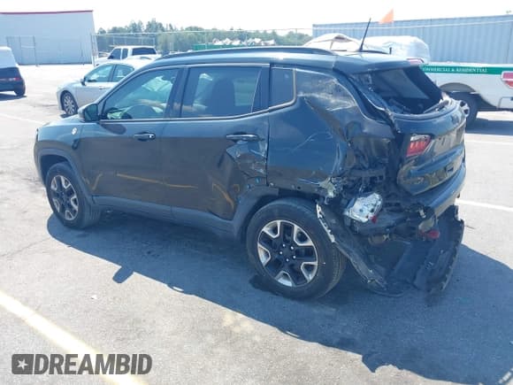 ✅ 2017 Jeep Compass Trailhawk • VIN: 3C4NJDDB7HT651906 • Lot: 43252109. Listed on IAAI with 76,217 mi. Free auction sales archive from the USA and detailed vehicle history report at DreamBid. Image 3.