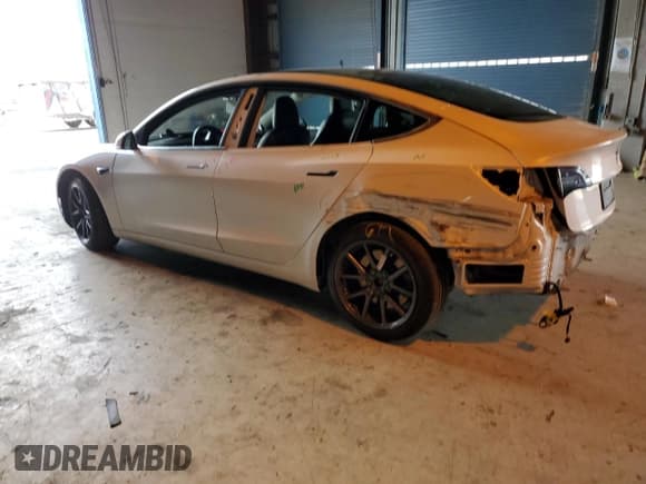 ✅ 2020 Tesla Model 3 Long Range • VIN: 5YJ3E1EB0LF619024 • Лот: 84633295. Опубликован ранее на Copart с пробегом 99 802 миль. Бесплатный доступ к архиву аукционных продаж из США и подробный отчёт об истории автомобиля на DreamBid. Изображение 2.