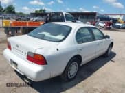 ✅ 1996 Nissan Maxima GXE • VIN: JN1CA21D6TT183479 • Лот: 42374066. Опубликован ранее на IAAI с пробегом 194 346 миль. Бесплатный доступ к архиву аукционных продаж из США и подробный отчёт об истории автомобиля на DreamBid. Изображение 4.