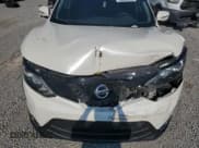 ✅ 2017 Nissan Rogue SV • VIN: JN1BJ1CR9HW134569 • Lot: 68833335. Listed on Copart with 77,092 mi. Free auction sales archive from the USA and detailed vehicle history report at DreamBid. Image 12.