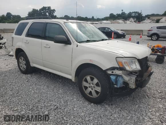 2011 Mercury Mariner z VIN 4M2CN8B71BKJ01749, wystawiony jako Copart lot #64199345 z przebiegiem 157 001 mil mil oraz Szkoda całkowita • Salvage title. Historia ofert i sprzedaży dostępna na DreamBid. Obrazek 4.