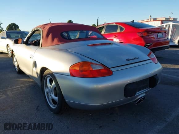 ✅ 1999 Porsche Boxster • VIN: WP0CA2986XU630686 • Lot: 43874393. Listed on IAAI with 177,045 mi. Free auction sales archive from the USA and detailed vehicle history report at DreamBid. Image 3.