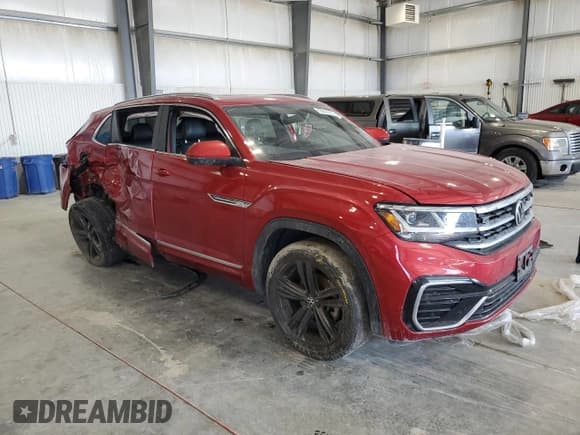 ✅ 2022 Volkswagen Atlas SEL R-Line • VIN: 1V2SE2CA1NC200173 • Lot: 83846385. Listed on Copart with 63,768 mi. Free auction sales archive from the USA and detailed vehicle history report at DreamBid. Image 4.