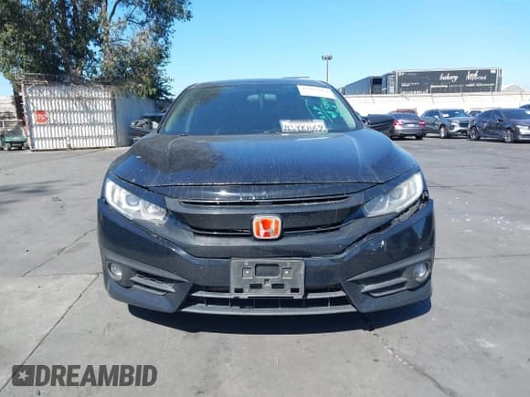 ✅ 2017 Honda Civic EX-T • VIN: 2HGFC1F34HH643033 • Лот: 43412614. Опубликован ранее на IAAI с пробегом 132 167 миль. Бесплатный доступ к архиву аукционных продаж из США и подробный отчёт об истории автомобиля на DreamBid. Изображение 12.