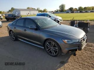 ✅ 2016 Audi S6 Premium Plus • VIN: WAUF2AFC9GN195344 • Лот: 75687244. Опубликован ранее на Copart с пробегом 91 345 миль. Бесплатный доступ к архиву аукционных продаж из США и подробный отчёт об истории автомобиля на DreamBid. Изображение 4.