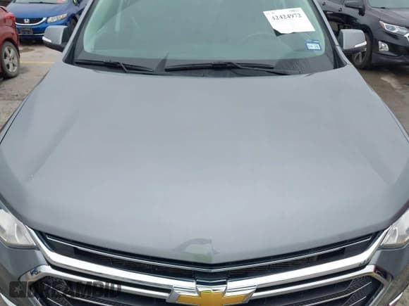 ✅ 2021 Chevrolet Traverse LT Cloth • VIN: 1GNERGKW8MJ210147 • Lot: 42424972. Listed on IAAI with 51,752 mi. Free auction sales archive from the USA and detailed vehicle history report at DreamBid. Image 6.