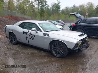 ✅ 2019 Dodge Challenger SXT • VIN: 2C3CDZGG9KH717332 • Lot: 42240698. Listed on IAAI with 118,359 mi. Free auction sales archive from the USA and detailed vehicle history report at DreamBid. Image 1.