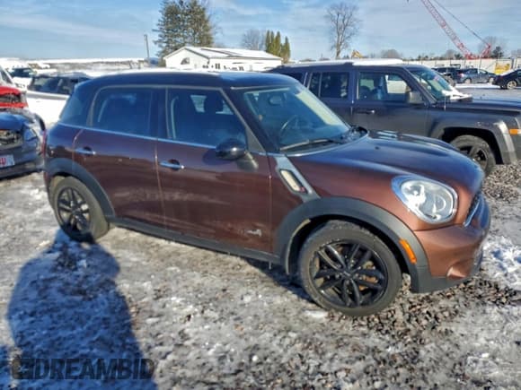 ✅ 2014 MINI Countryman S • VIN: WMWZC5C59EWP39467 • Lot: 94575355. Listed on Copart with 127,263 mi. Free auction sales archive from the USA and detailed vehicle history report at DreamBid. Image 4.