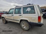 ✅ 2001 Jeep Cherokee Sport • VIN: 1J4FF48S01L597568 • Lot: 95472095. Listed on Copart with 299,978 mi. Free auction sales archive from the USA and detailed vehicle history report at DreamBid. Image 2.